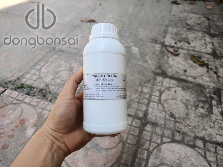 Thuốc lũa bonsai chai 500ml màu nâu vàng